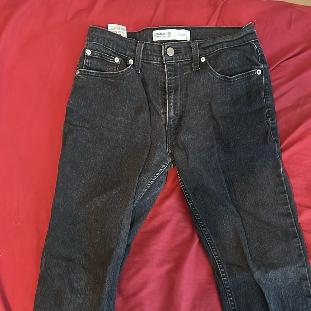 Pair of black Levi jeans.